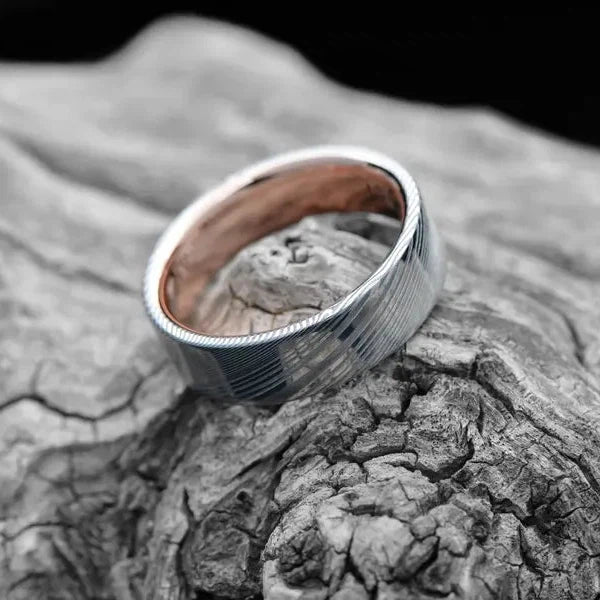 Unique Damascus Men's Wedding Band with Rose Gold Inner Sleeve | 7mm