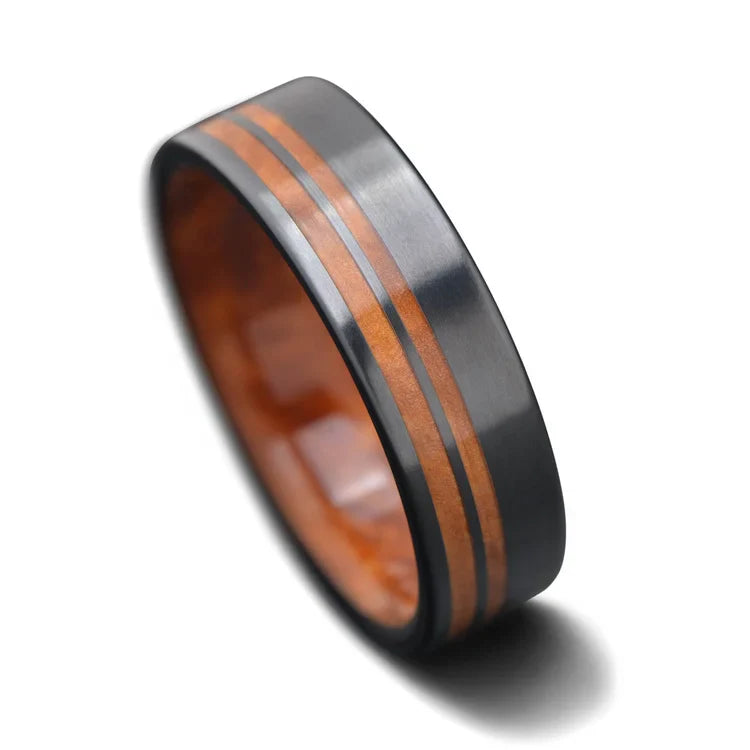 Black titanium wedding band with Western maple burl inlays, featuring a unique brushed finish, 7mm mens ring, free engraving option, displayed on a white background.