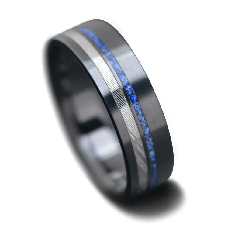 Black titanium wedding band with dense twist design and lapis lazuli inlays, 7mm mens ring, unique and customizable with free engraving, displayed on a white background.