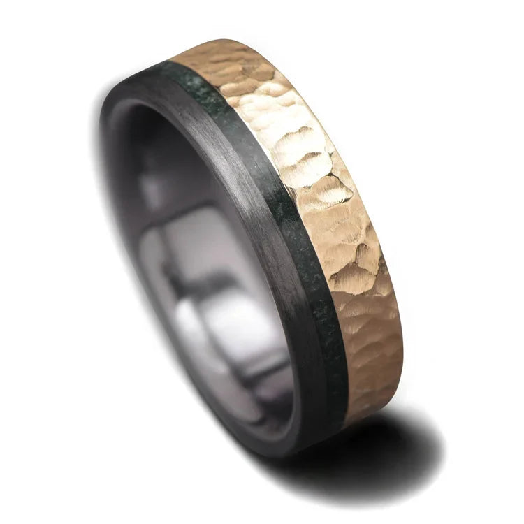14KY mens wedding band featuring unidirectional and moss agate inlays, 7mm hammered flat profile, unique design with free engraving, displayed on a white background