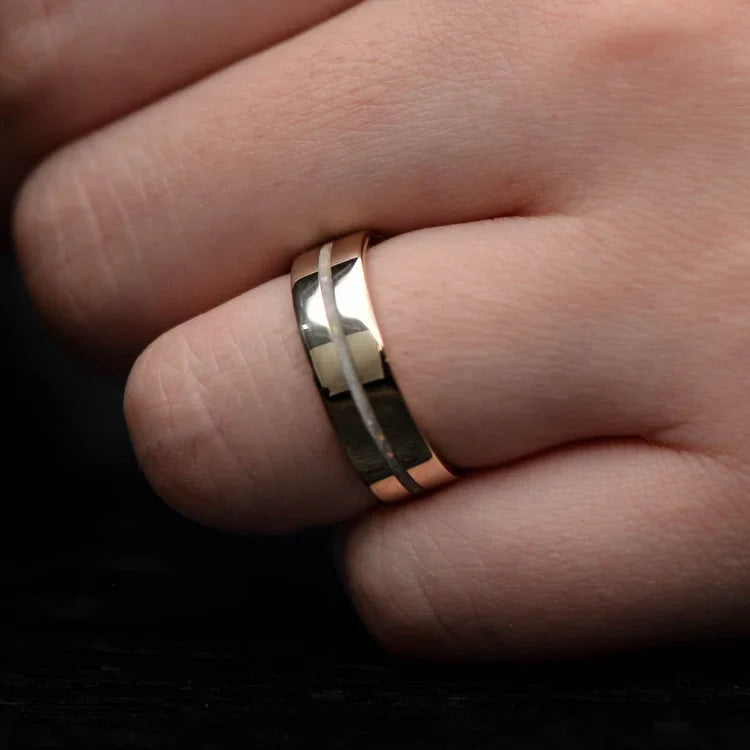 14K yellow gold mens wedding band with central pearl opal inlay and flush set diamond, polished flat profile, 6mm width, shown on a hand, free engraving available