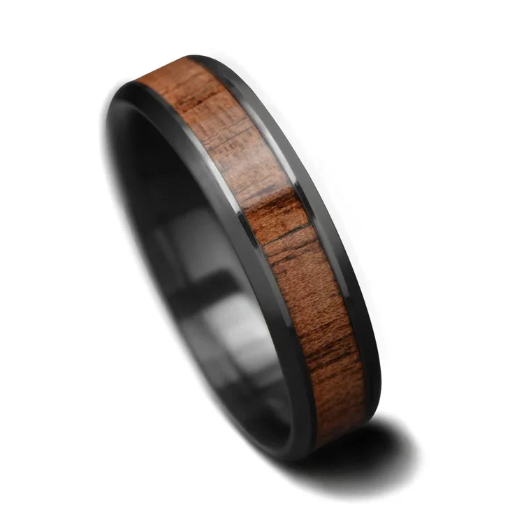 Black titanium wedding band with central walnut inlay, free engraving, 6mm mens wedding ring, brushed bevel profile, on a white background.