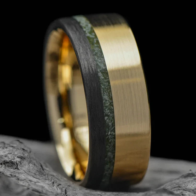 14KY gold mens wedding band with unidirectional and chrome diopside inlays, unique custom design, 8mm width, free engraving, displayed on a white sea branch background.