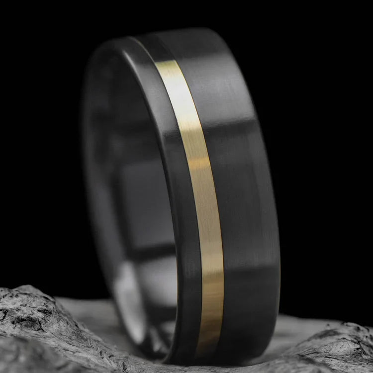 Zirconium wedding band with 14KY gold inlay, mens 8mm brushed flat profile ring, custom design, free engraving, displayed on white sea branch.