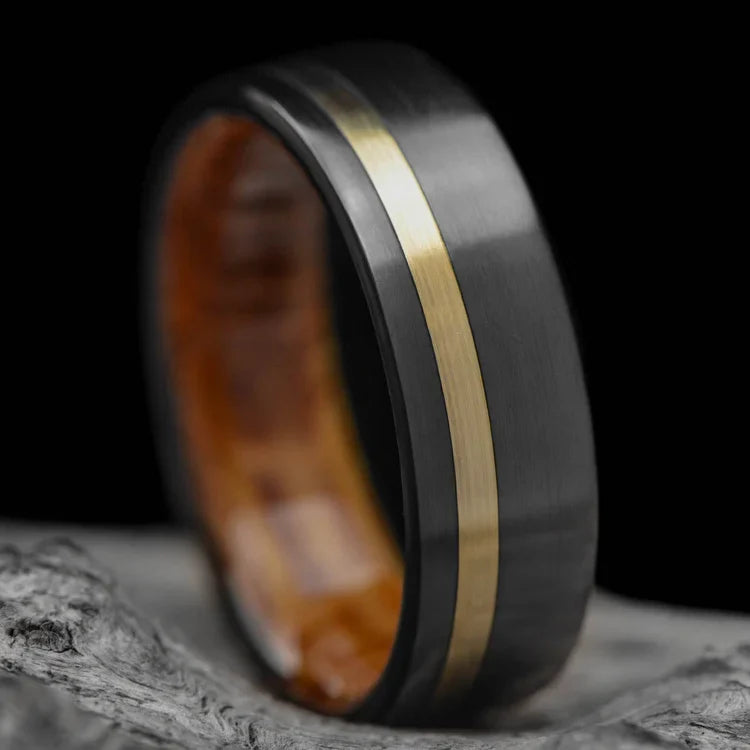 Black Titanium Wedding Band with 10K Yellow Gold and Whiskey Barrel Oak Inlay, 7mm Mens Ring on White Sand, Unique Mens Wedding Band with Free Engraving