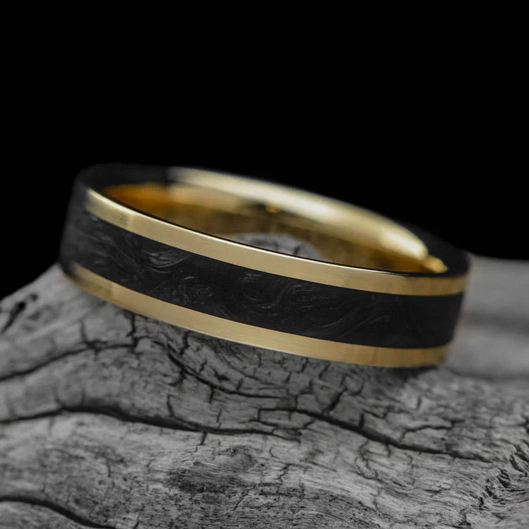 10KY gold mens wedding band with central forged inlay, custom brushed flat profile, 6mm width, displayed on a white sea branch, free engraving available