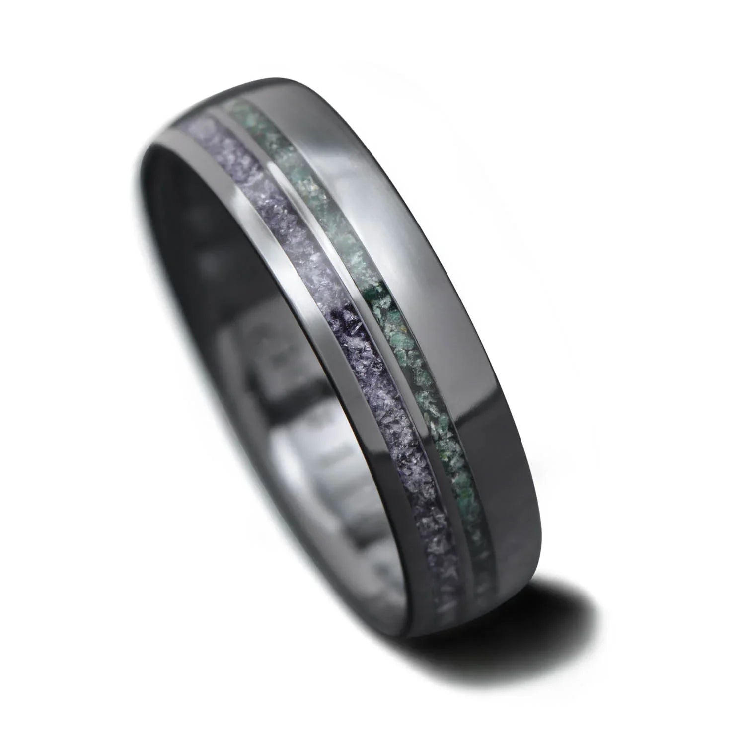 Black titanium wedding band with amethyst and moss agate inlays, 6mm mens domed polished ring, unique design, free engraving available, displayed on a white background.