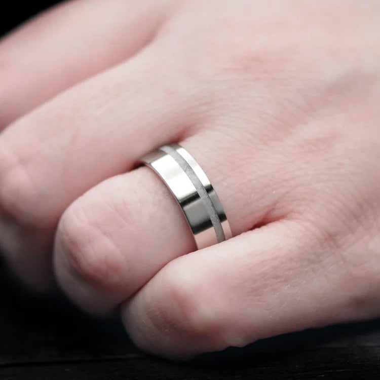 Mens 10KW wedding band with pearl inlay, brushed flat profile, 7mm width, custom ring with free engraving, shown on hand.