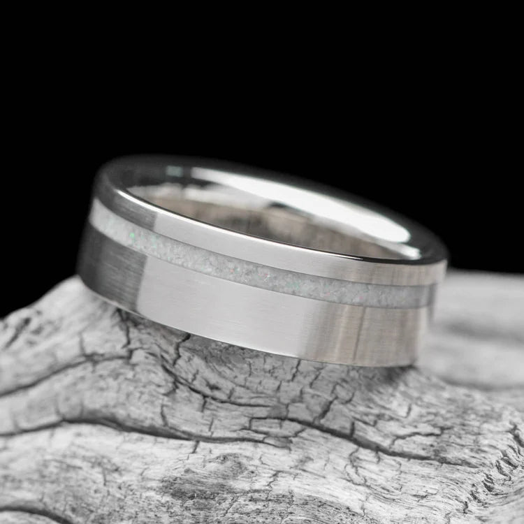 Mens 10KW wedding band with pearl inlay, brushed flat profile, 7mm width, custom ring on white sea branch, free engraving available.
