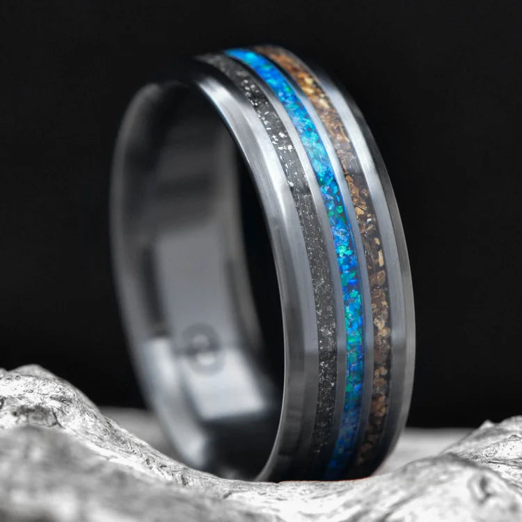 Black titanium ring with meteorite, crushed T-Rex bone, and blue opal inlay on white sea branch, 7mm mens wedding band, unique design with free engraving.