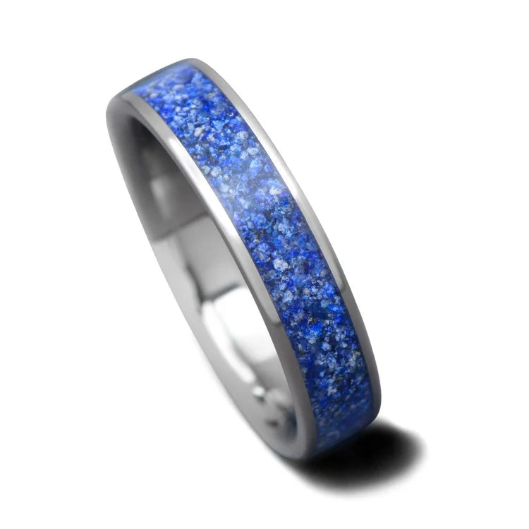 Titanium wedding band with central lapis lazuli inlay, 5mm width, custom simple ring, unique wedding band on white background, free engraving option available.