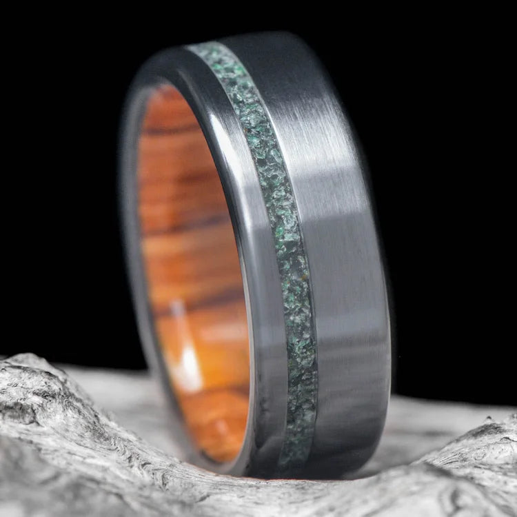 Black Titanium Wedding Band with Moss Agate and Olivewood Inlay, 7mm Mens Ring, on White Sea Branch Background, Unique Design, Free Engraving Available