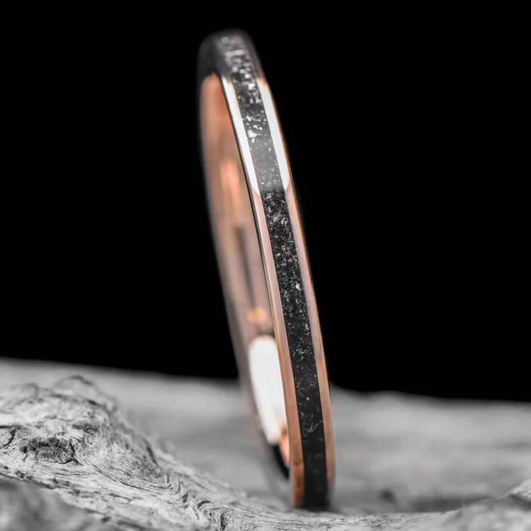 14K Rose Gold Wedding Band with Central Meteorite Inlay, 2mm Womens Unique Custom Design, Free Engraving, displayed on a white sea branch.