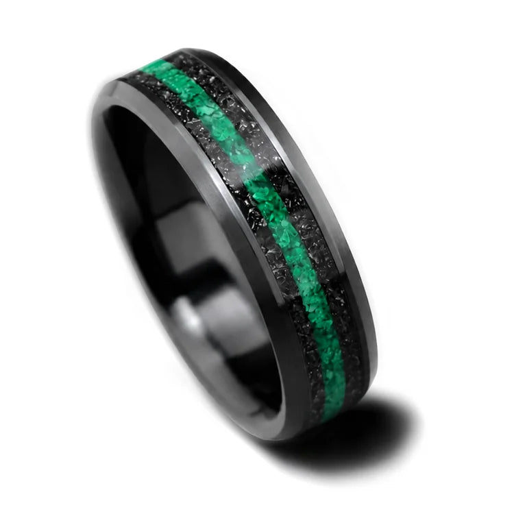 Black titanium wedding band featuring dual meteorite and central malachite inlays, 6mm mens ring on a white background, unique design with free engraving option.