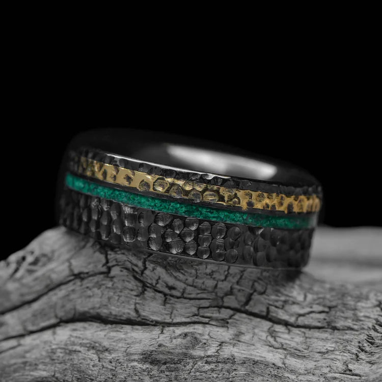 Black Titanium Wedding Band with 18K Yellow Gold and Malachite Inlays, 8mm Mens Ring, Hammered Flat Profile, Unique Design, Free Engraving, on White Sea Branch Background