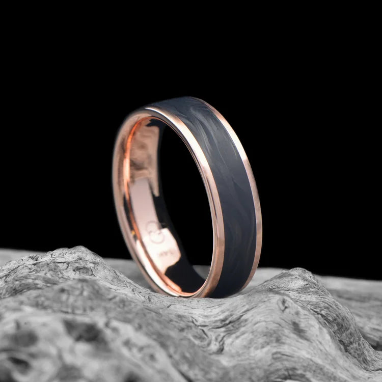 14K Rose Gold Men's Wedding Band with Central Forged Inlay and Brushed Finish, 6mm, Customizable with Free Engraving, displayed on white sea branch