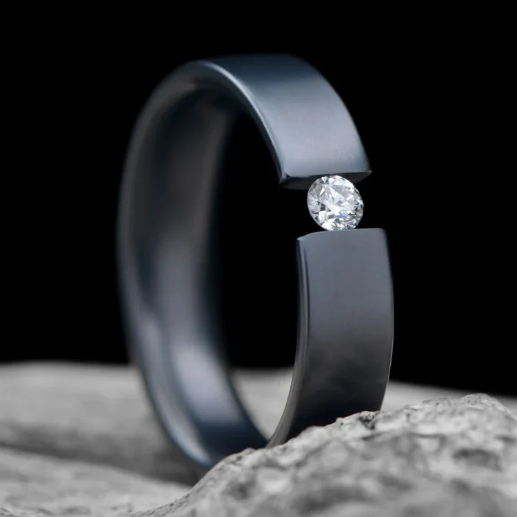 Black titanium wedding band with tension set diamond on white sea branch, 5mm custom unique wedding ring with free engraving.