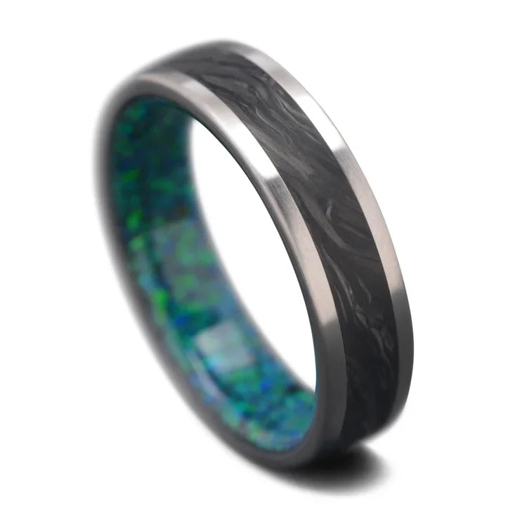 Titanium wedding band with central forged inlay and black emerald opal sleeve, 6mm mens unique ring, free engraving, displayed on a white background.