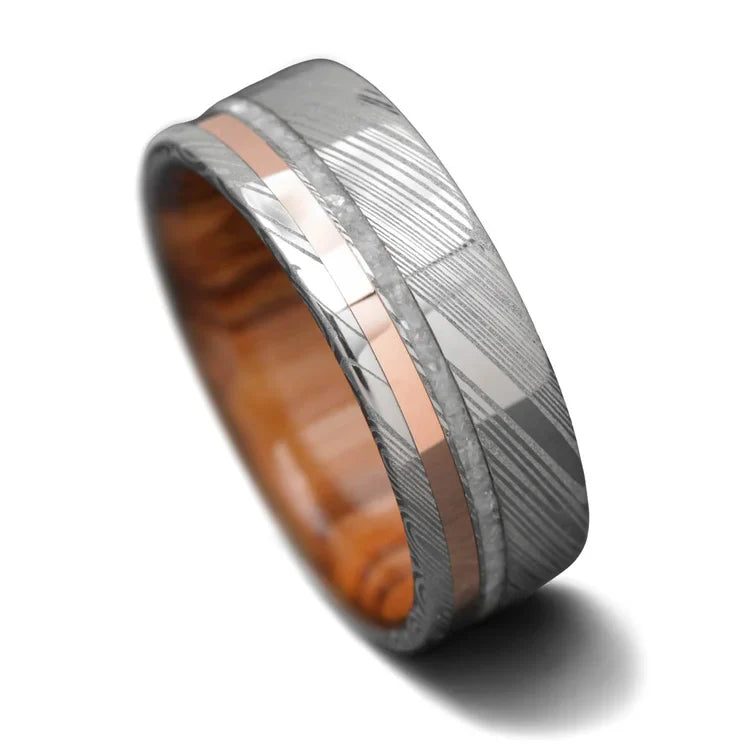 Heimskringla mens wedding band, 14K rose gold with pearl inlays, 8mm width, olivewood inner sleeve, polished flat profile, free engraving, on white background.