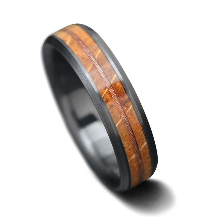 Black titanium wedding ring with whiskey barrel oak and stranded copper wire inlays, 6mm mens band, unique design, free engraving available, displayed on a white background.
