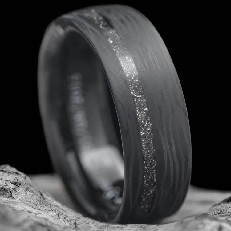 Cross-Cut Wave Ring with Meteorite and Central Inlay, 7mm Mens Wedding Band, Matte Finish, Unique Design, Free Engraving, displayed on a white sea branch.
