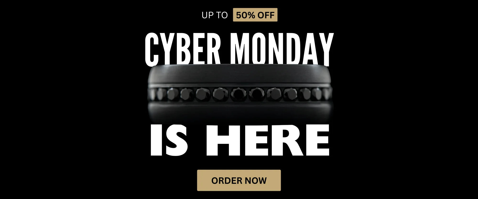 Black custom wedding ring with black diamonds displayed on a black background with the text “Cyber Monday Is Here – Up to 50% Off.