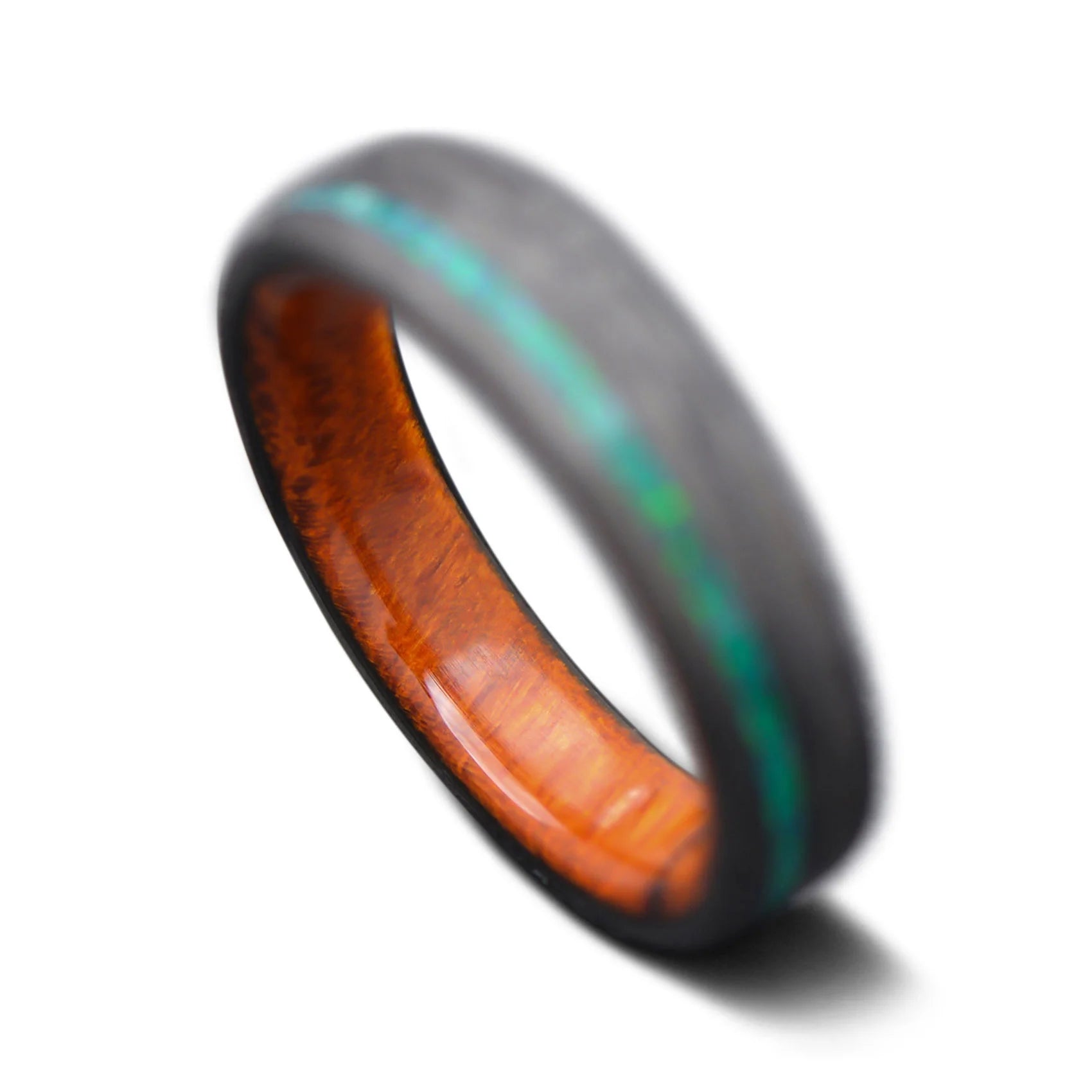 Back of forged Carbon fiber ring with emerald opal inlay and Desert Ironwood inner sleeve, 5mm -THE HORIZON