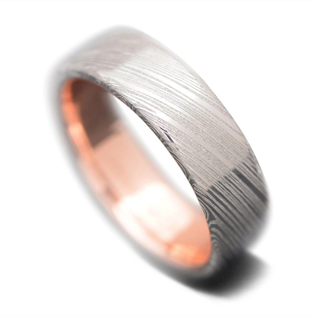 Unique Damascus Men's Wedding Band with Rose Gold Inner Sleeve