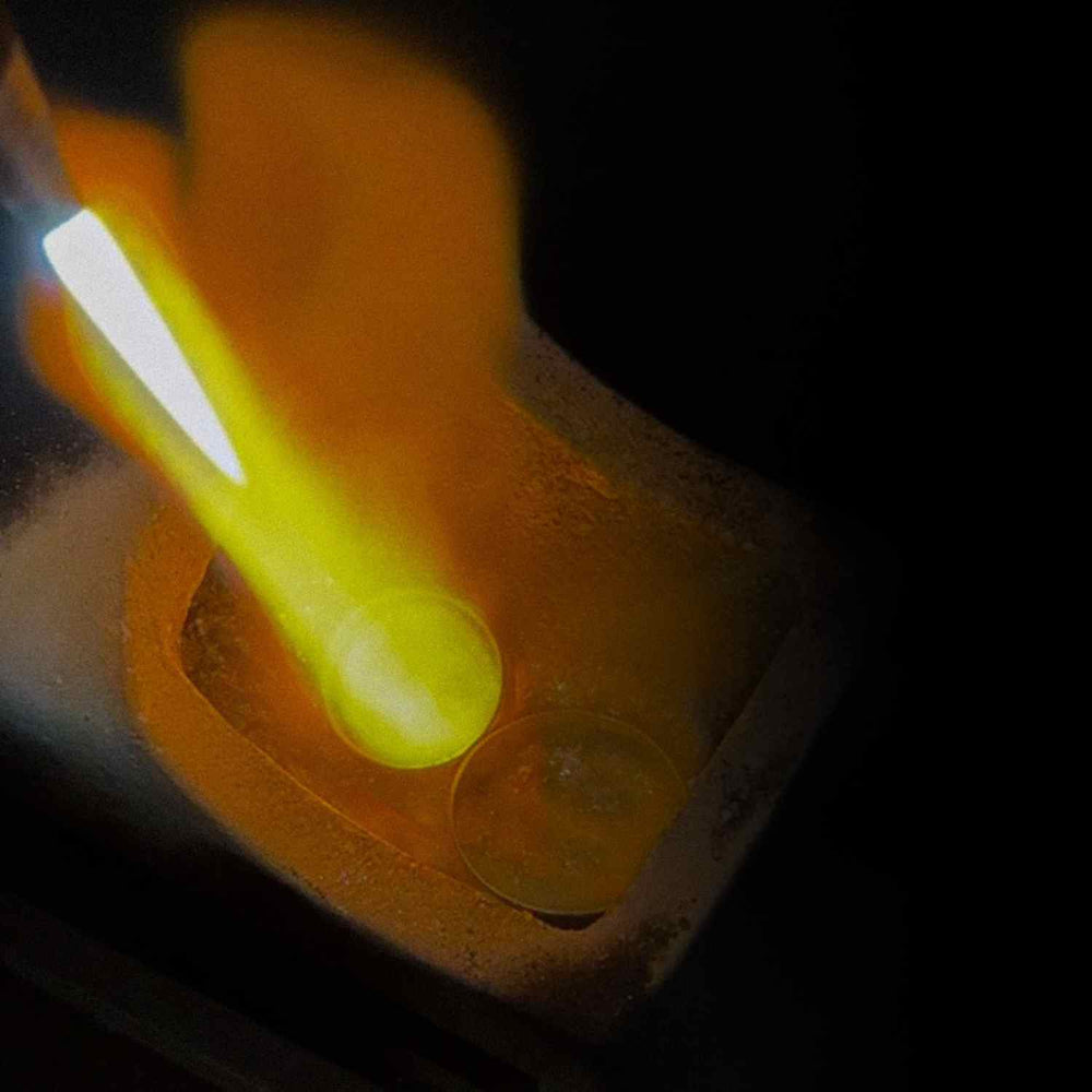 Heirloom gold being melted down and reworked into a new custom wedding ring.