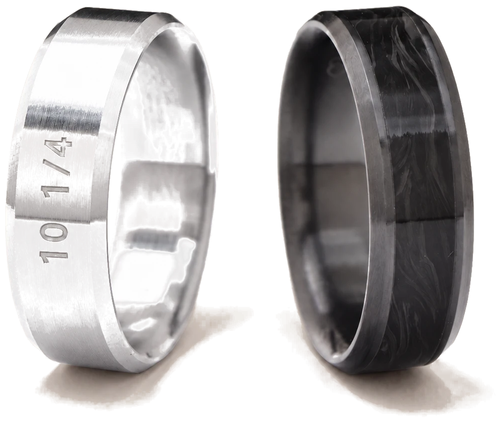 A silver ring sizer marked 10 1/4 beside a black forged carbon one