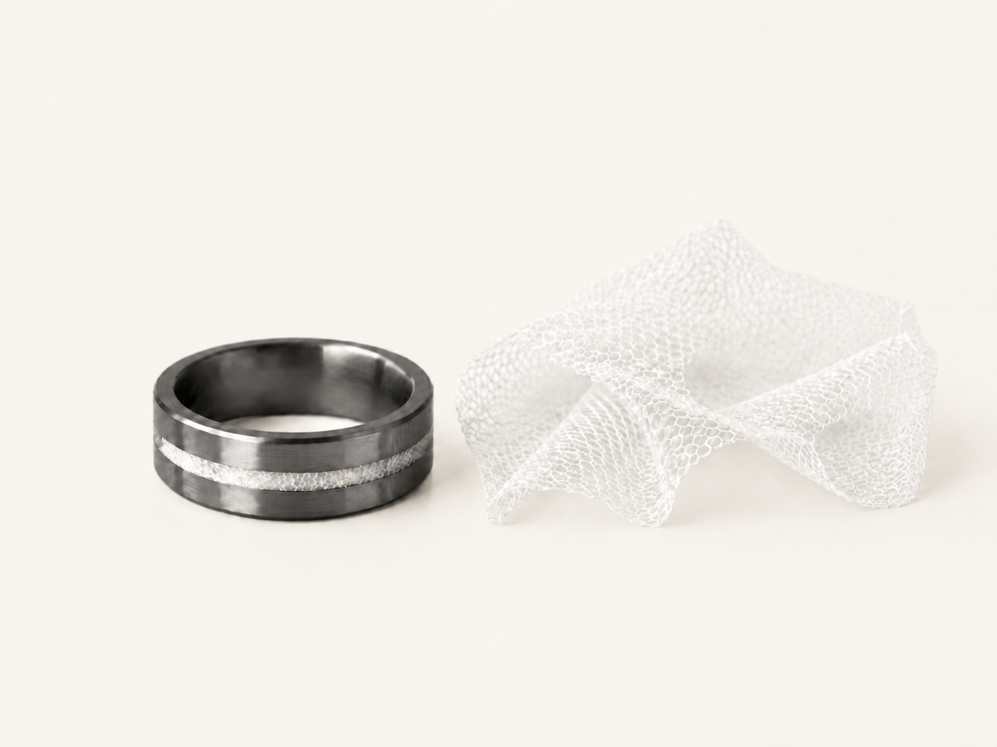 Men's tantalum wedding band inlaid with a piece of the bride's wedding dress.