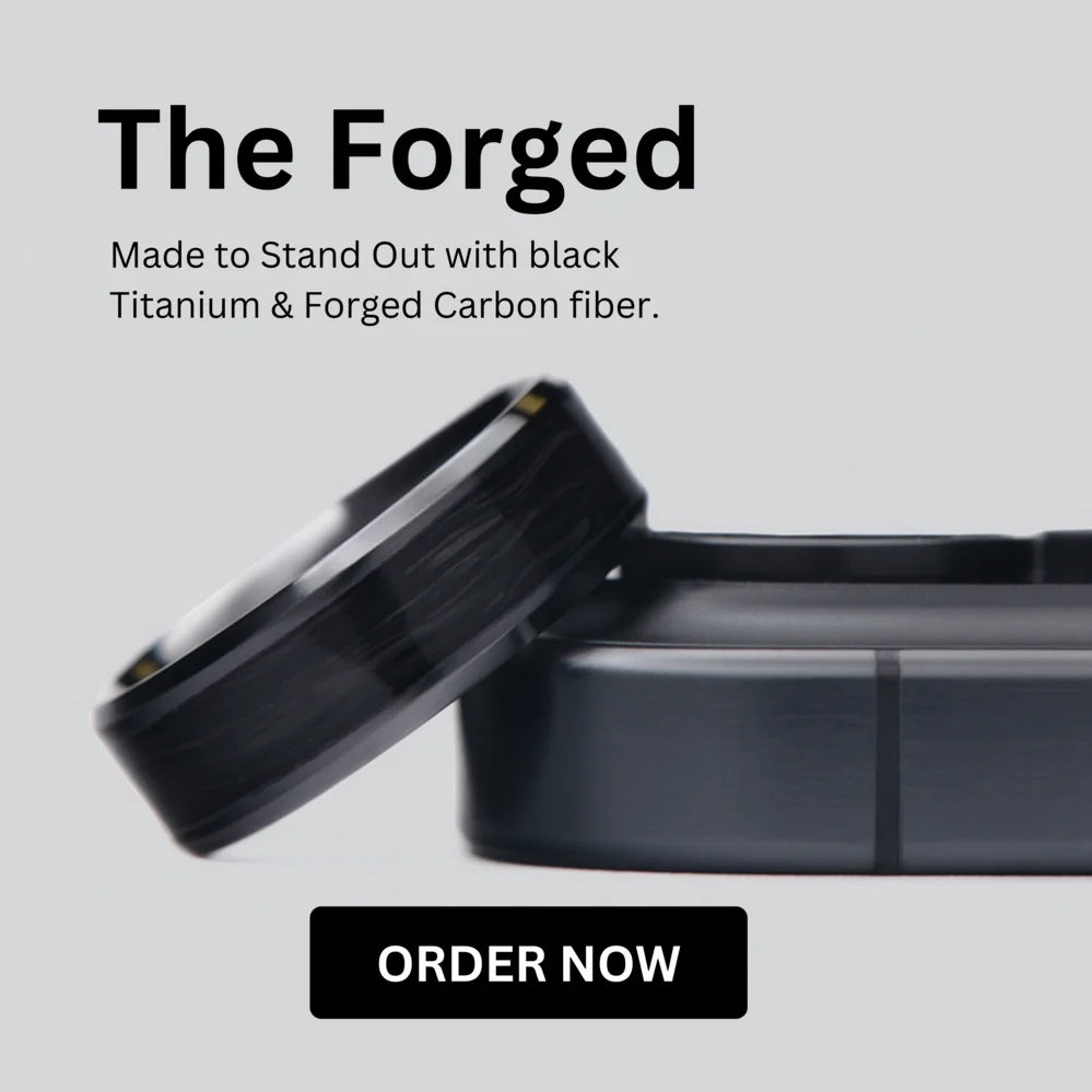 Discover The Forged: a bold wedding ring crafted from black titanium and forged carbon fiber. Durable, lightweight, and made to stand out from the ordinary.
