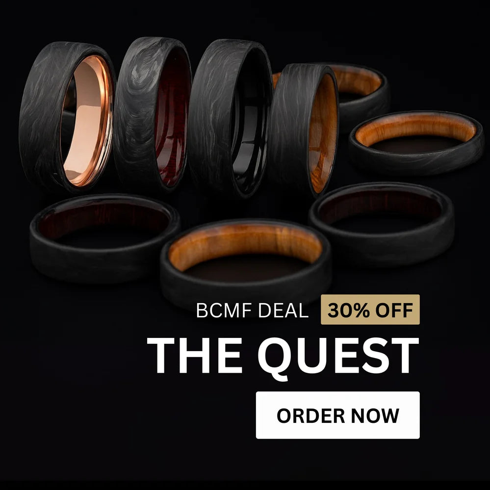 Display of forged carbon wedding rings from The Quest collection featuring copper and wood interiors, shown with a 30% off Black Friday deal.