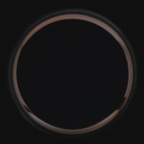 Black titanium wedding band with 18K rose gold inner sleeve, free engraving, 7mm mens wedding ring, brushed domed profile.