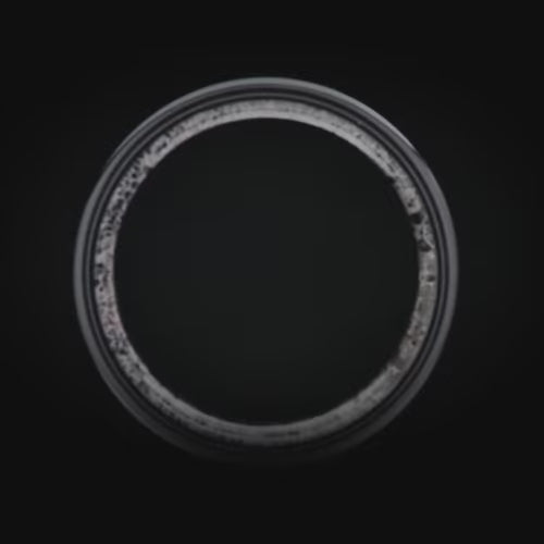 Black titanium mens wedding band featuring a moss agate and guitar string inlay, with a deer antler inner sleeve, 7mm width, offering free engraving, unique design for men.